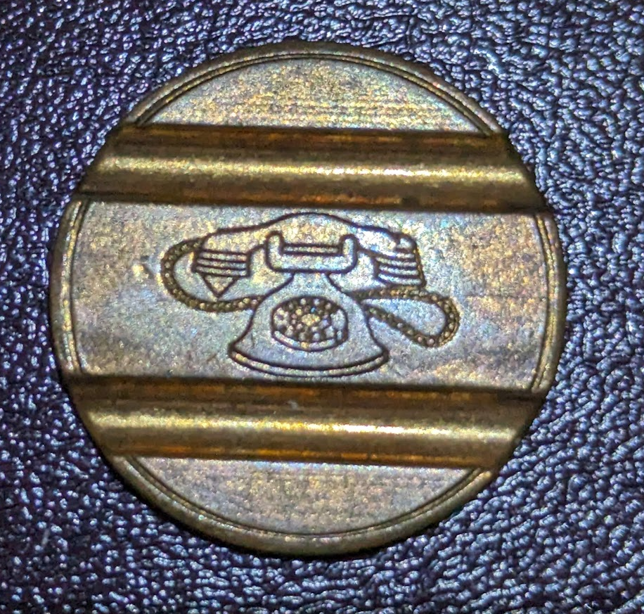 Image of telephone between two grooves