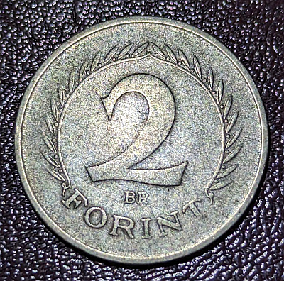 Denomination within 3/4 wreath, mintmark under numeral.

Script: Latin

Lettering: 2 FORINT BP.

Designer: Iván István