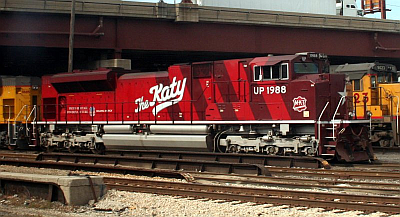 Red with dark red stripes Union Pacific 1988, with "The Katy" on the side.