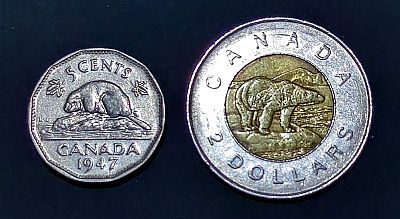 Canadian 5 cents (with denomination above a beaver above the country and year) and 2 dollars (Bimetallic with the country above, denomination below and a large polar bear walking in the center)