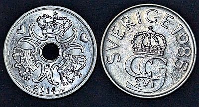 Denmark 2014 5 Kroner featuring three crowned M's, three hearts and the year.  To its right is a Swedish 1985 5 Kronor featuring a crowned CG XVI Cypher, the country and year