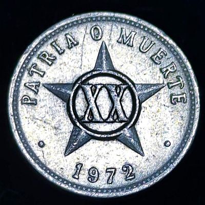 Value in Roman numerals in circle over a five-pointed star, motto "Fatherland or Death" as curved legend on top, date on excergue`, line of denticles close to rim.

Script: Latin

Lettering:
PATRIA O MUERTE
XX
• 2006 •

Translation:
Fatherland or Death
XX (20)
2006

Engraver: Charles Edward Barber Read more on Wikipedia