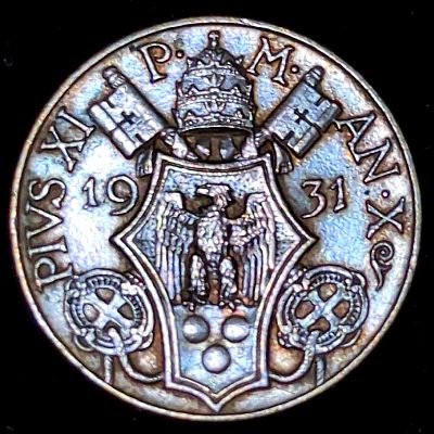 Coat of arms of Pius XI dividing dates, name of the Pope Script: Latin Lettering: PIVS XI P· M· AN·XIII 19 34 Engraver: Aurelio Mistruzzi