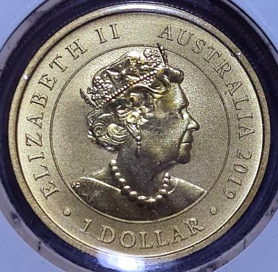 Obverse of the coin: 6th portrait of Her Majesty Queen Elizabeth II facing right wearing the King George IV State Diadem and the Victorian Coronation Necklace Script: Latin Lettering: ELIZABETH II AUSTRALIA 2010 1 DOLLAR JC Designer: Jody Clark Read more on Wikipedia