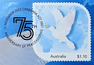 Stamp featuring dove holding olive branch. Postmark with 75 in the centre, then a circle of text around reading 11 November 2022 Canberra ACT 2601 / Anniversary of peacekeeping