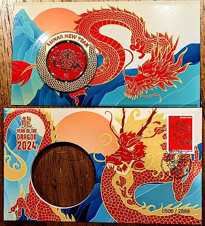 Reverse of the inner card featuring the medallion on the left and a dragon weaving behind and to the right of the medallion, looking left.  The piece is sitting on a table with the empty envelope Below .