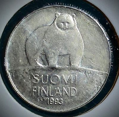 Brown bear (Ursus arctos arctos) standing, looking outwards

Script: Latin

Lettering:
SUOMI
FINLAND
1991

Translation: Finland