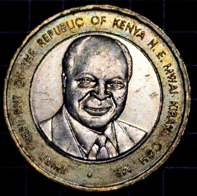 Bust of President Mwai Kibaki facing forward.

Script: Latin

Lettering: THIRD PRESIDENT OF THE REPUBLIC OF KENYA H.E. MWAI KIBAKI, CGH, MP. ·