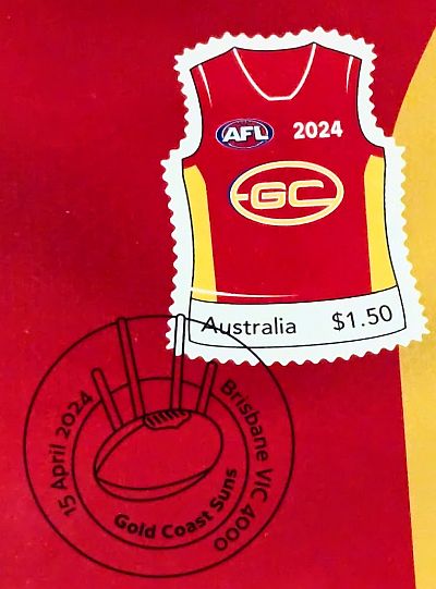 Stamp in the shape of a Gold Coast team jersey with Australia $1.50 below. Cancellation is 15 April 2024, Brisbane VIC 4000 with Gold Coast Suns and a football and goal posts