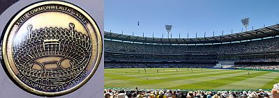 Gold/Nickel medallion with XVIII Commonwealth Games above, the MCG in the centre and the caption Melbourne Cricket Ground below. to the right is a photo of the actual MCG