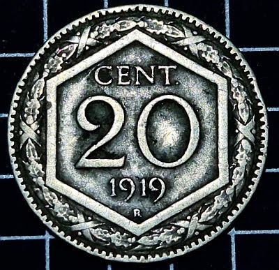 Value and date of the coin within a hexagon surrounded by a laurel wreath and the mintmark below the date Script: Latin Lettering: CENT. 20 1920 R Engraver: Attilio Silvio Motti